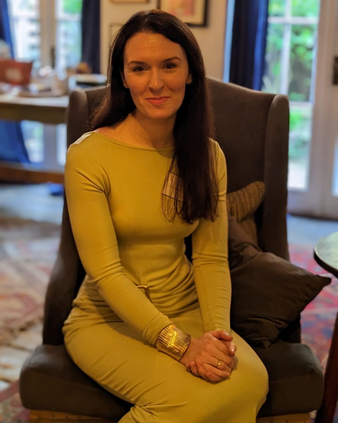 Laura Mitchell sitting in a chair at the MOREVER Meetup